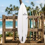 rfboard standing in a sunny Hawaiian outdoor rack