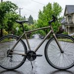 Commuter bike climbing a steep Portland hill in rainy weather